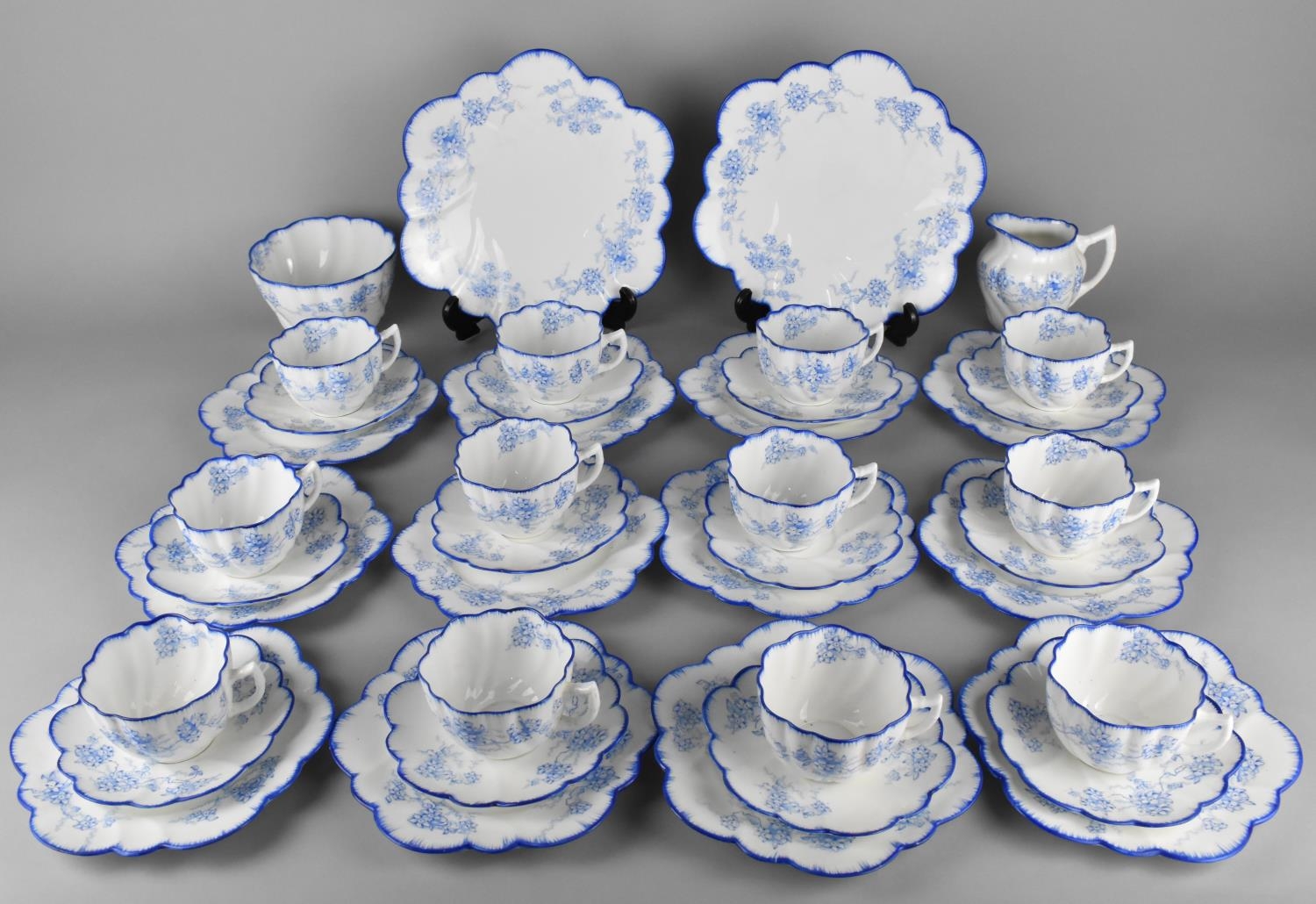 A Grafton China & Sons Blue Floral Decorated Tea Set to Comprise Twelve Cups, Twelve Saucers, Twelve