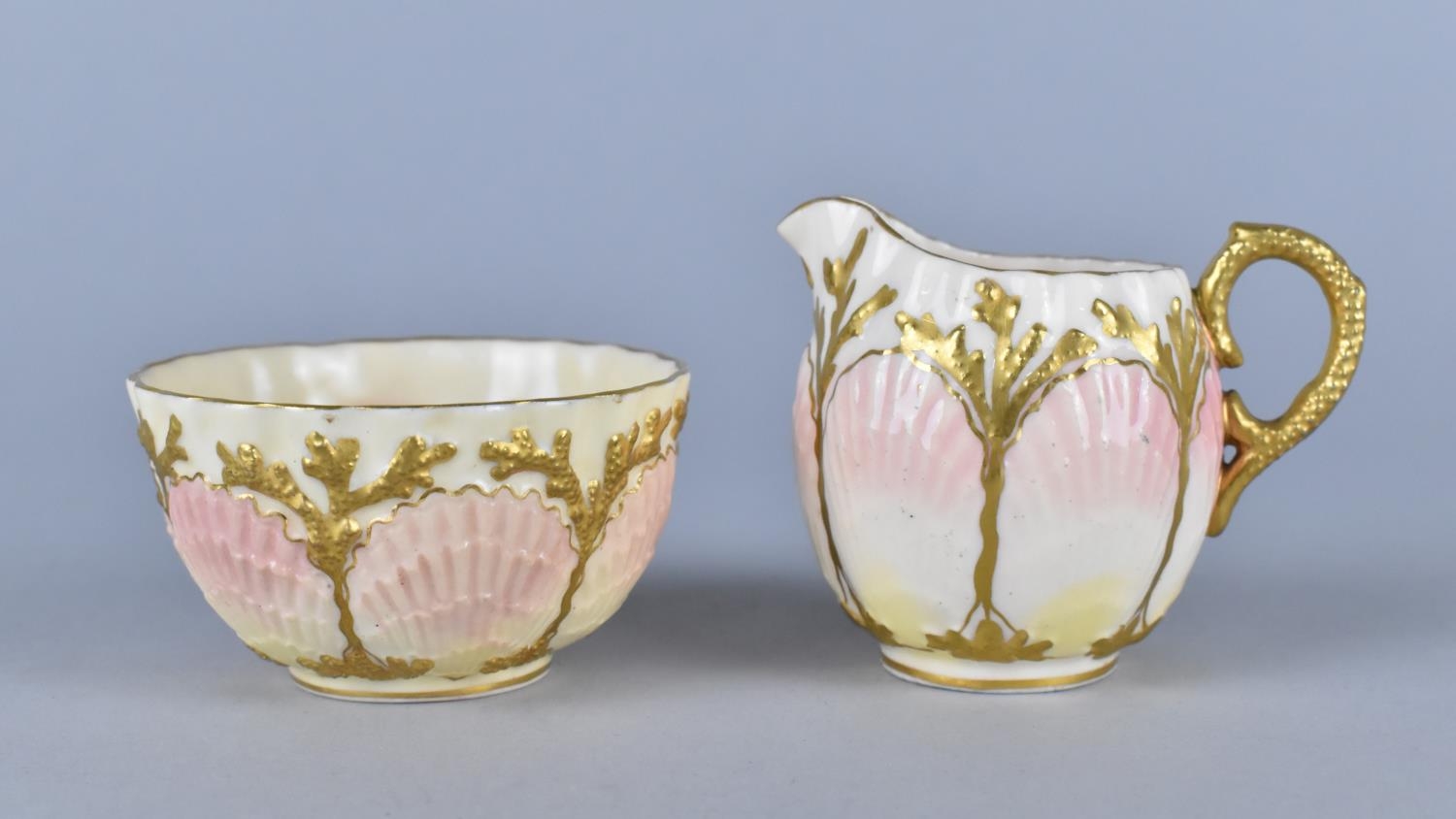 A Late 19th/Early 20th Century Coalport Aesthetic Jug and Bowl of Moulded Shell Form and Enriched