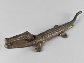 A Small Cast Iron Novelty Nutcracker in the Form of a Crocodile, 22cms Long