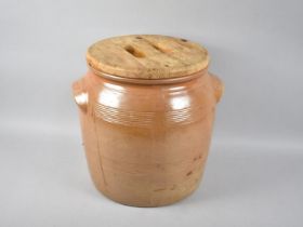 A Salt Glazed Two Handled Circular Stoneware Container with Wooden Lid, 32cms Diameter