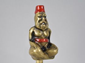 A Heavy Cast Brass Car Mascot in the Form of Seated Arab Gent with Fez, Stamped Under RR25, 11cms