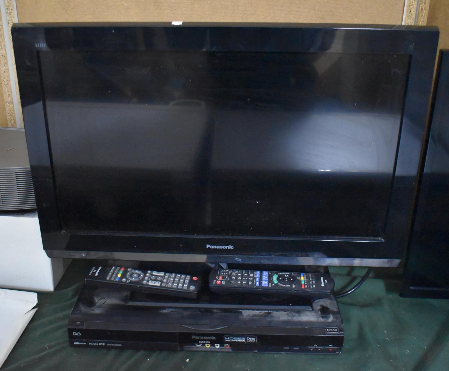 A Panasonic 24" TV Together with Panasonic HDD & DVD Player