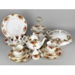 A Collection of Royal Albert Old Country Roses China to Comprise Tea Cups and Saucers, Teapot (Spout