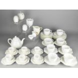 A Collection of Coalport White Glazed Teawares to Comprise Miniature Cups and Saucers, Tea Cups