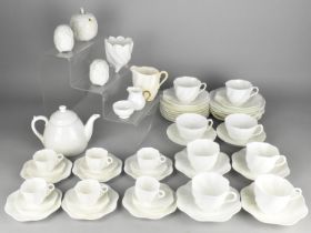 A Collection of Coalport White Glazed Teawares to Comprise Miniature Cups and Saucers, Tea Cups