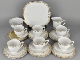 A Gilt Floral Trim Decorated Tea Set to Comprise Six Cups, Six Saucers, Six Side Plates Milk Jug and