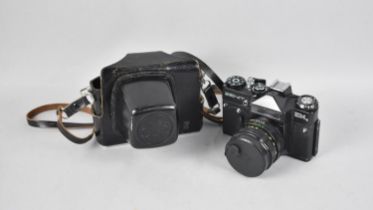 A Vintage Russian Zenit 35mm Camera in Leather Case
