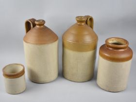 A Collection of Four Various Stoneware Bottles and Storage Jars