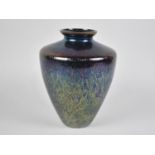 A Modern Iridescent Glass Vase by Royal Brierley, 20cms high