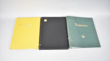 A Stamp Album and Two Stamp Stock Books, One with Contents