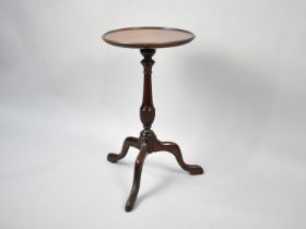 A Mid 20th Century Mahogany Tripod Wine Table, 28cms Diameter and 49cms High