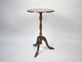 A Modern Circular Topped Tripod Wine Table, 35cms Diameter