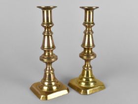 A Pair of Victorian Brass Candlesticks with Pushers, 23cms High