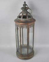 A Single Octagonal Bronzed Metal Lantern, 58cms high