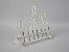 A Reproduction Novelty Silver Plated Novelty Six Slice Toast Rack, The Dividers in the Form of