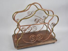 An Art Nouveau Copper and Brass Two Division Magazine Rack on Mahogany Plinth, 37cm Wide