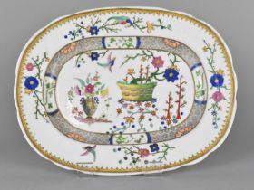An English Porcelain Platter Hand Painted in Polychrome Enamels Detailing Oriental Garden Setting
