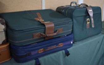 A Collection of Various Suitcases to Include Examples by Samsonite and Shilton
