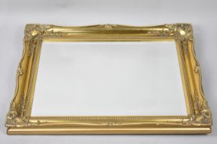 A Modern Gilt Framed Rectangular Wall Mirror, 76x60cms Overall