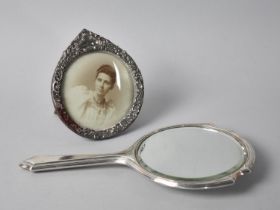 A Circular Silver Mounted Easel Back Photo Frame, Some Losses, together with a Silver Dressing Table