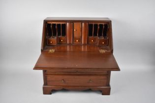 A Modern Mahogany Miniature Fall Front Bureau with Fitted Interior and Two Short and Two Long