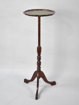 A Late 20th Century Mahogany Tripod Torchere Stand with Circular Top having Tooled Leather Panel,