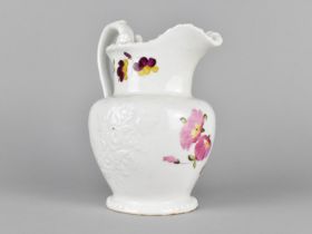 A 19th Century English Porcelain Jug Having Moulded Floral Body and Hand Painted with Flowers,