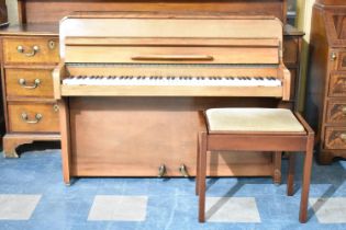 A Modern Walnut Framed Upright Piano with Stool