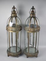 A Pair of Bronzed Metal Hexagonal Lanterns on Four Scrolled Feet, 79cms High