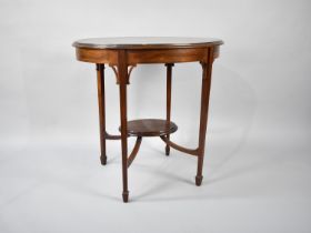 An Edwardian Mahogany Oval Topped Occasional Table on Tapering Square Supports, with Oval