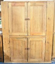 A 19th Century Stripped Pine Double Pantry Cupboard with panelled Doors to Upper and Lower Shelf