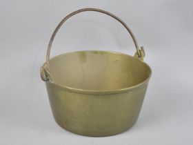 A Vintage Brass Jam Kettle with Loop Handle, 26cms Diameter