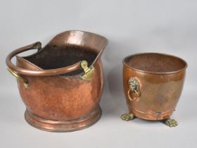 A Mid 20th Century Copper Helmet Shaped Coal Scuttle together with a Copper Planter having Brass