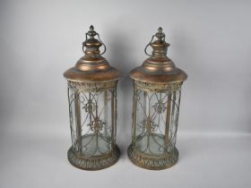 A Pair of Cylindrical Bronzed Metal Lanterns, 57cms High