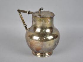 A Silver Plated and Lidded Hot Water Jug, Truscott's Tenby Hot Water Jug, 15cms High