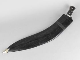 A Far Eastern Kukri Knife in Scabbard with Two Daggers , Leather Scabbard, 65cm Long