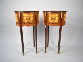 A Pair of Reproduction Inlaid French Style Oval Three Drawer Chests on Extended Cabriole Supports