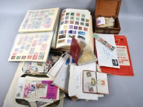 A Child's Stamp Album and Contents, Stamped Envelopes, Loose Stamps, Stamp Stock Book etc