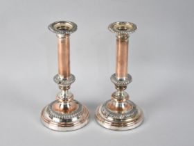 A Pair of Sheffield Plate Candlestick, Weighted Bases, Stamped To Holders "Warranted Silver