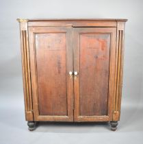A 19th Century Scumble Glazed Shelved Cabinet with Panelled Doors, Having White Ceramic Handles,