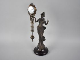 A Reproduction Art Nouveau Style Bronze Figural Mystery Clock in the Form of a Maiden, 33cm high
