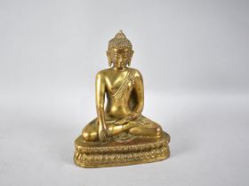 A Weighted Polished Bronze Gold Plated Thai Buddha Set on Lotus Throne, 15cm wide and 20cm high