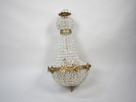 A Large Reproduction French Style Faux Crystal and Ormolu Ceiling Chandelier, 78cm High