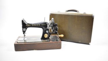 A Vintage Cased Singer Manual Sewing Machine No.EF.634193