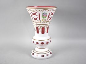 A Mid 19th Century Overlaid Bohemian Cranberry Glass Vase with Floral Decoration, 26cm High