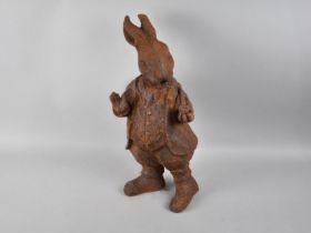 A Rusted Metal Garden Ornament in The Form of a Anthropomorphic Rabbit with Pipe, 43cm high