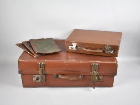 A Vintage Suitcase, Fitted Document Case and Three Continental Tooled Leather Blotting Pads