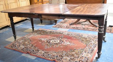 A 19th Century Mahogany Pull Out Extending Dining Table with Two Extra Leaves, Tapering Reeded