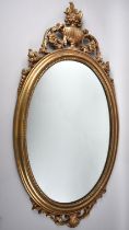 A Mid/Late 20th Century Gilt Framed Oval Mirror with Adam Style Vase Finial, 78x41cm Overall