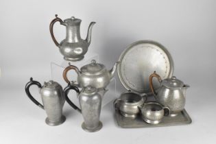 A Collection of Various Hand Beaten Pewter Tea and Coffee Wares to Comprise Teapots, Coffee Pots,